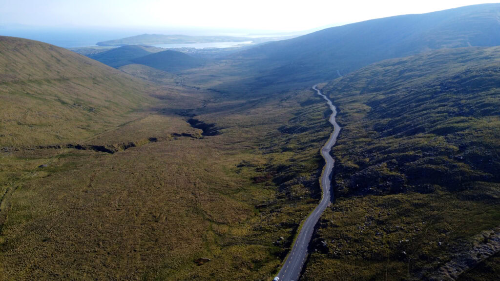 Driving Conor Pass with views of the surrounding mountains and valleys.