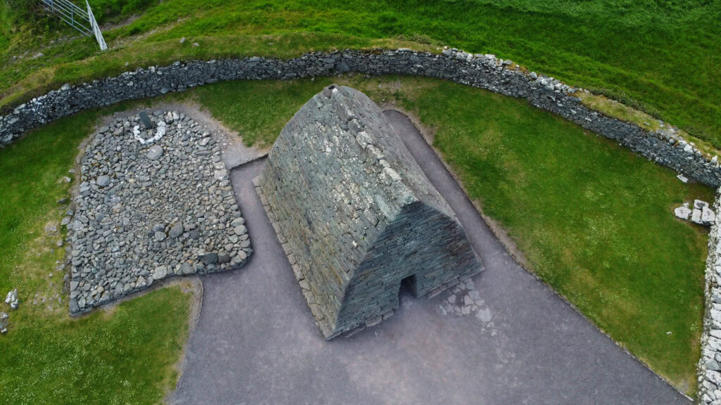 Overhead view of Gallarus Oratory’s stone structure and surrounding path on the Dingle Peninsula.