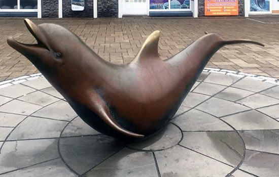 Statue of Fungie the Dolphin at Dingle Pier