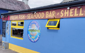 Out of the Blue chalkboard menu with daily seafood specials