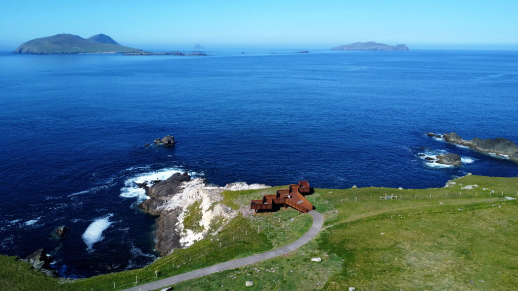 Dunquin viewing platform overlooking cliffs and sea stacks near the Blasket Sound.