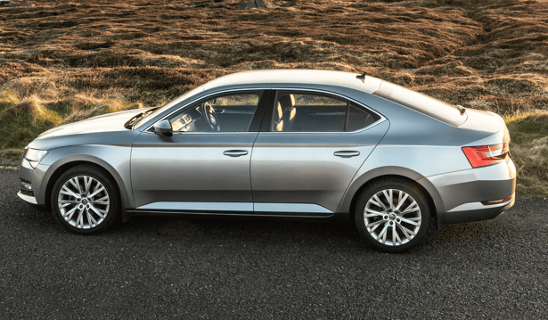 Silver Skoda Superb used by Steve's Peninsula Tours parked at a scenic viewpoint on the Dingle Peninsula, County Kerry.
