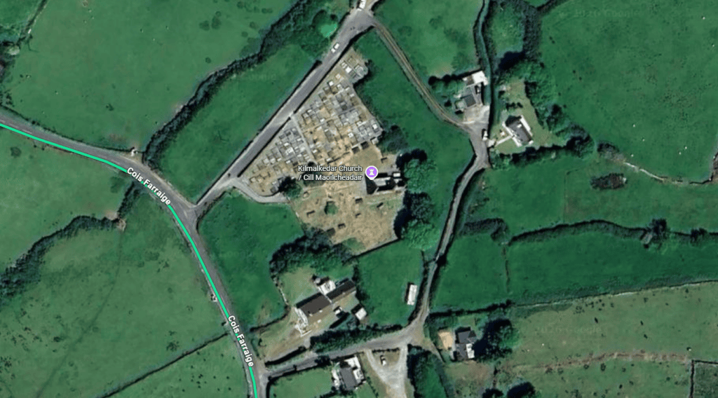 Aerial view of Kilmalkedar Church and its surrounding medieval graveyard on the Dingle Peninsula, County Kerry.