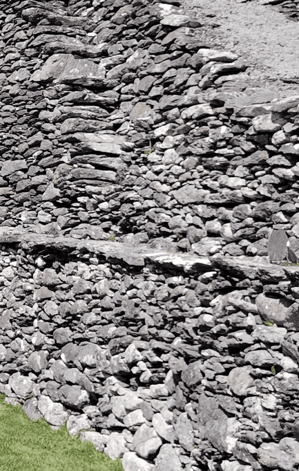 Close view of the dry-stone masonry within Staigue Fort showing carefully fitted stones and an internal stone feature.