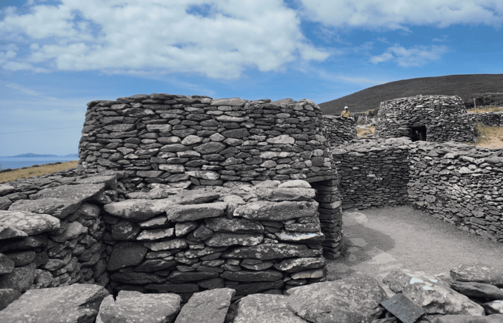 Dry-stone walls, pathways and clochán structures forming part of the archaeological settlement landscape at Fahan.