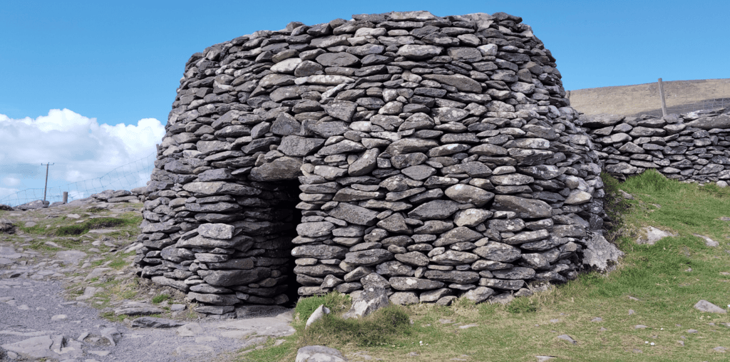 Stone-built Fahan Clochán with corbelled dry-stone walls on the Dingle Peninsula in County Kerry.
