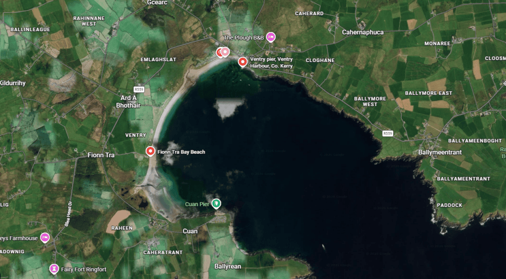 Satellite view of Ventry Harbour and the curved sandy shoreline of Ventry Beach on the Dingle Peninsula in County Kerry.