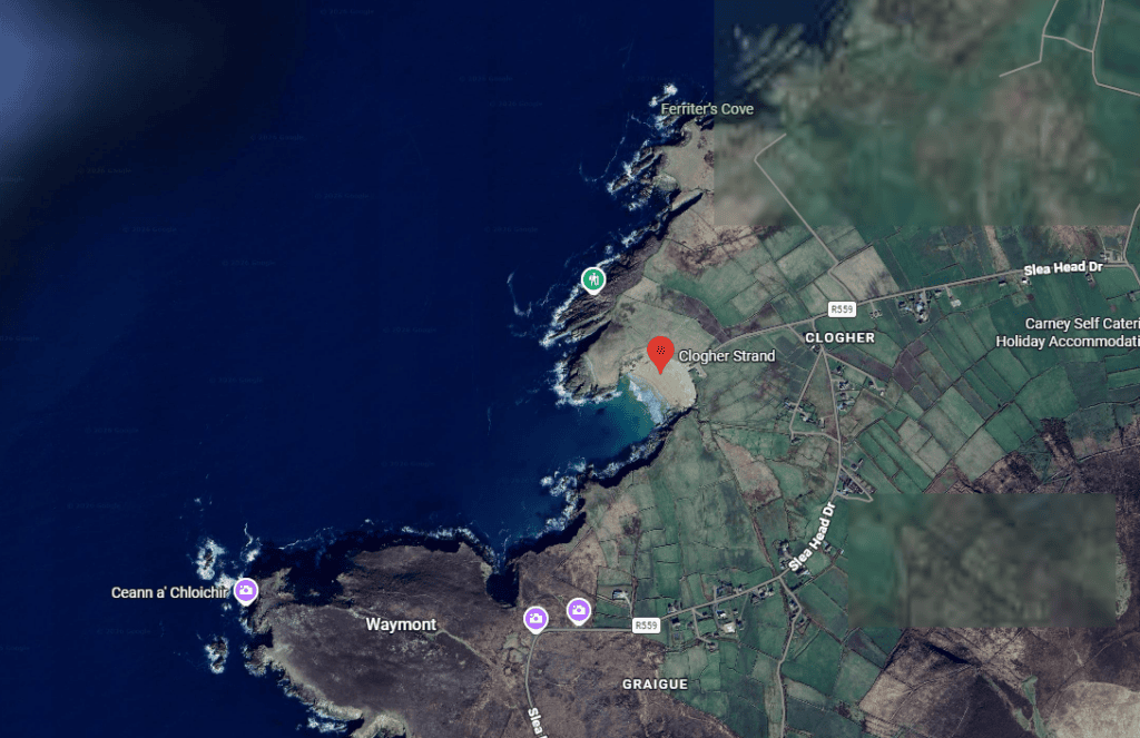 Satellite map showing Clogher Strand and the surrounding Atlantic coastline, roads and fields on the western Dingle Peninsula.