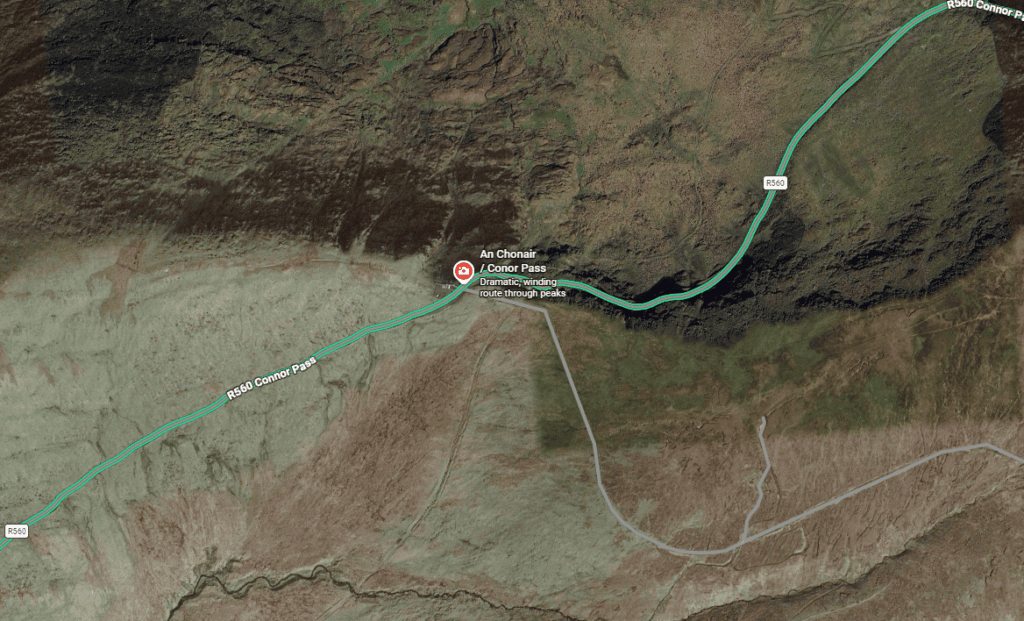 Satellite map showing the R560 crossing Conor Pass through the mountainous landscape of the Dingle Peninsula.