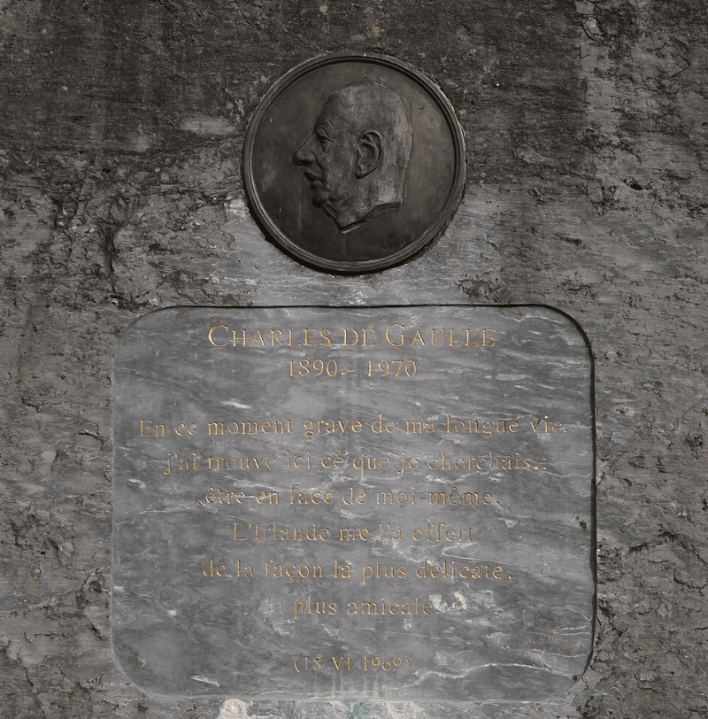 Charles de Gaulle Memorial in Sneem featuring a bronze portrait plaque above an inscribed stone tablet.